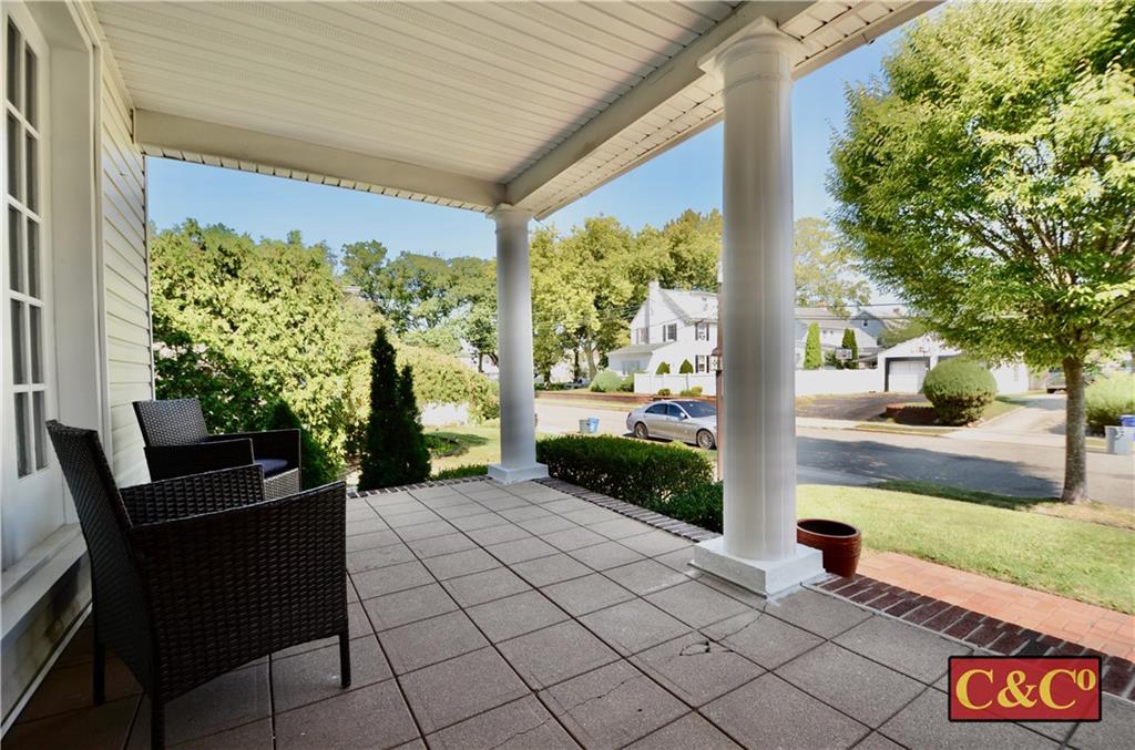 8 Oak Street Valley Stream, NY 11581 - Photo 2 of 40 a front view of a house with garden