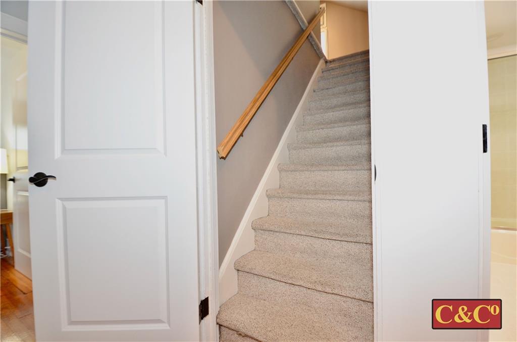 8 Oak Street Valley Stream, NY 11581 - Photo 21 of 40 a view of staircase with white walls and railing