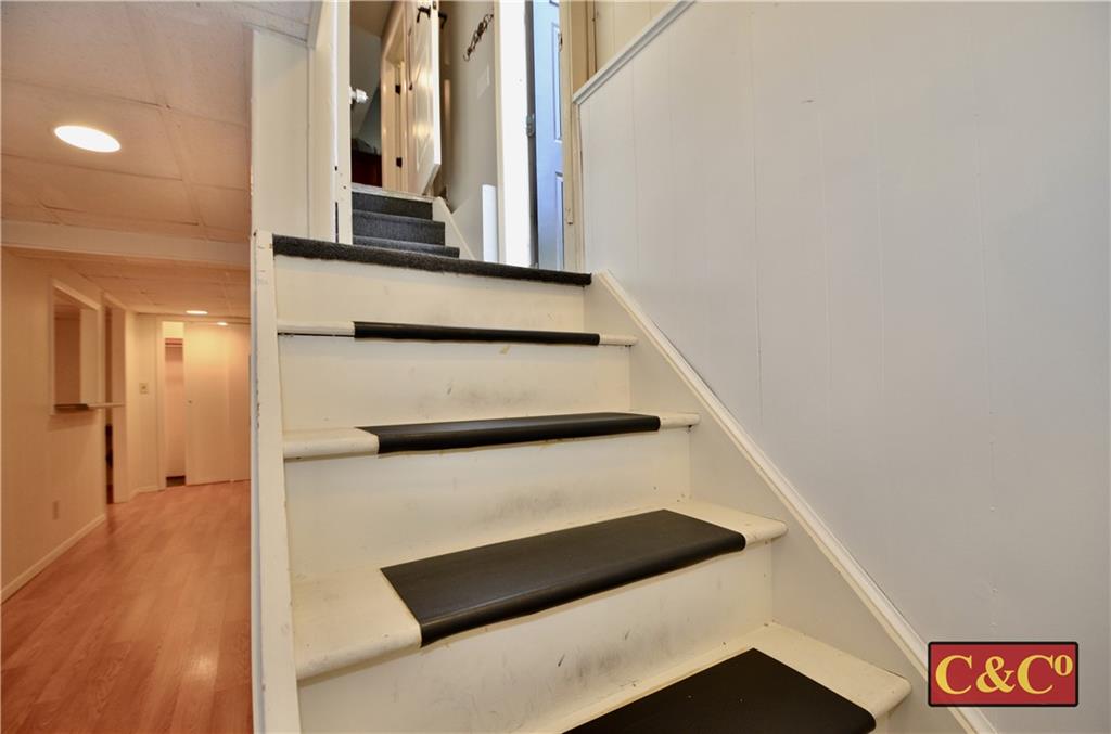 8 Oak Street Valley Stream, NY 11581 - Photo 25 of 40 a view of staircase with wooden floor