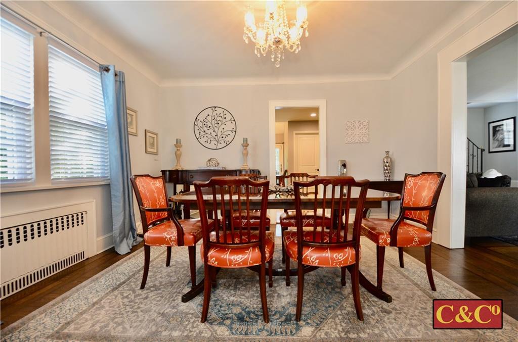 8 Oak Street Valley Stream, NY 11581 - Photo 8 of 40 a view of a a dining room with furniture window and wooden floor