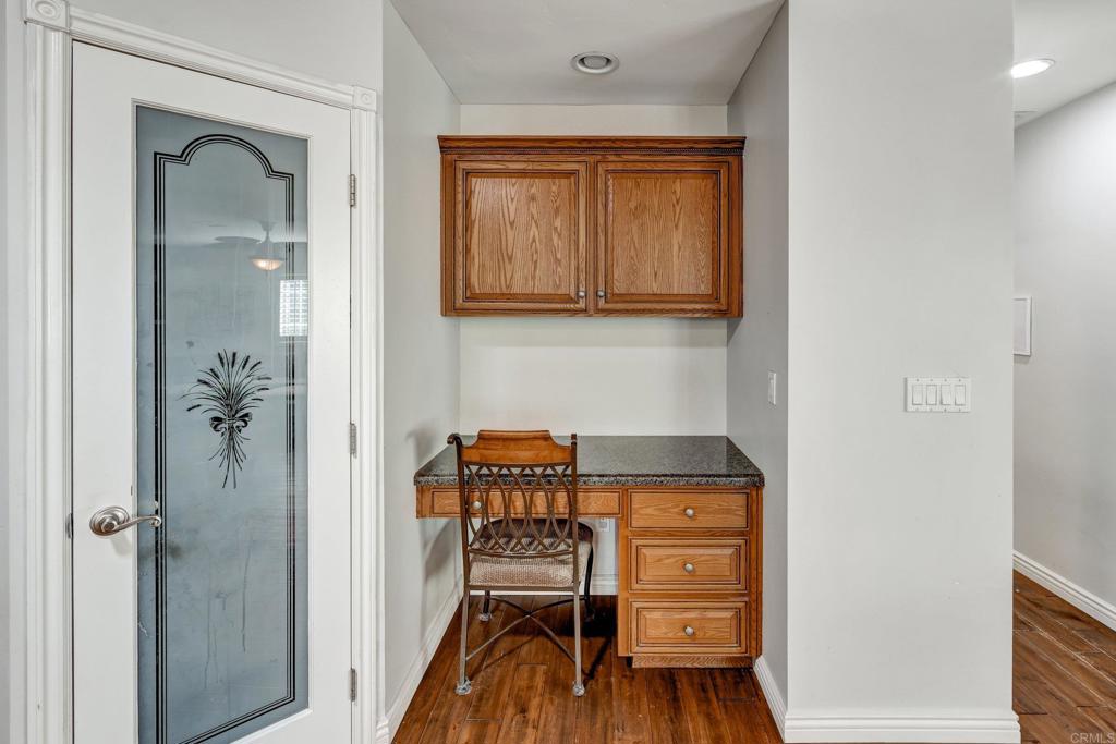 11985 Rocoso Road Lakeside, CA 92040 - Photo 13 of 48 a view of a hallway with entryway wooden floor and cabinet