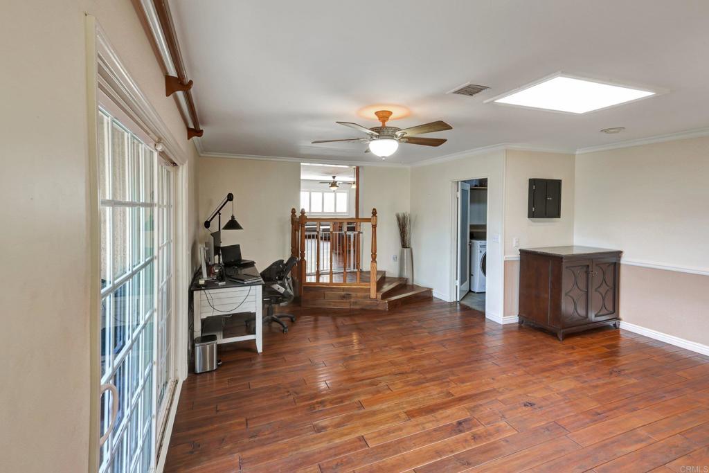 11985 Rocoso Road Lakeside, CA 92040 - Photo 16 of 48 a view of a livingroom with furniture and a ceiling fan