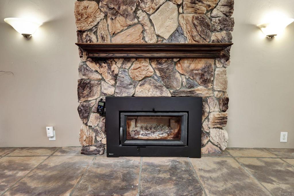 11985 Rocoso Road Lakeside, CA 92040 - Photo 18 of 48 a view of fireplace with a fireplace