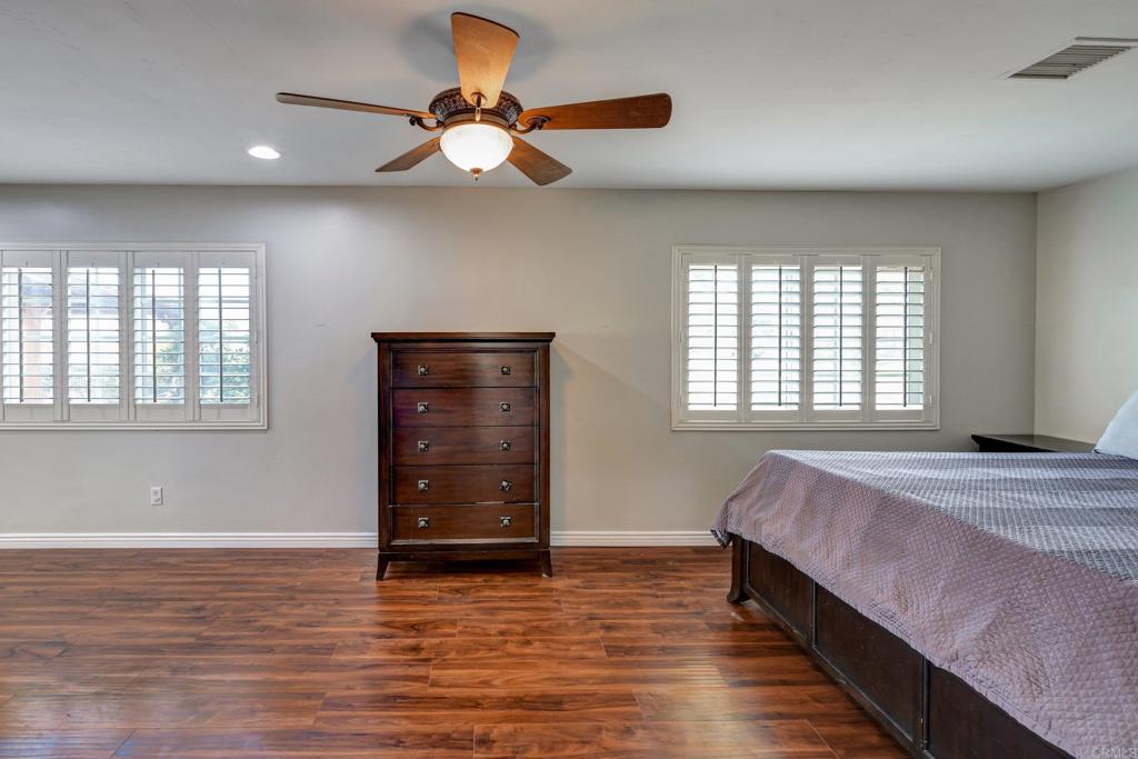 11985 Rocoso Road Lakeside, CA 92040 - Photo 21 of 48 a bedroom with furniture and a window