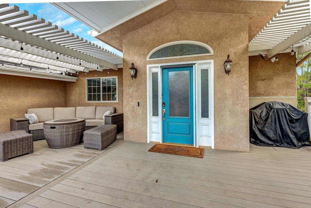11985 Rocoso Road Lakeside, CA 92040 - Photo 3 of 48 a view of a patio with couches and potted plants