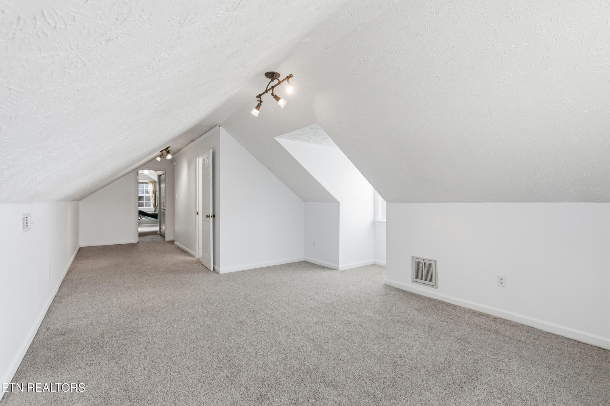10508 River Ridge Road Knoxville, TN 37922 - Photo 21 of 29 a view of a big room with closet and stairs