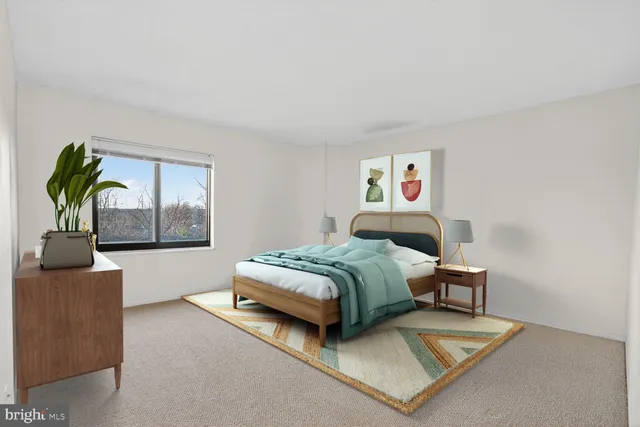 a bedroom with a bed and window