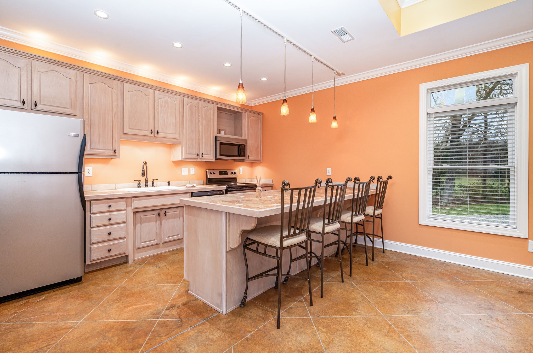 5827 Highway 76 East Springfield, TN 37172 - Photo 20 of 77 a kitchen with kitchen island granite countertop appliances cabinets and a dining table