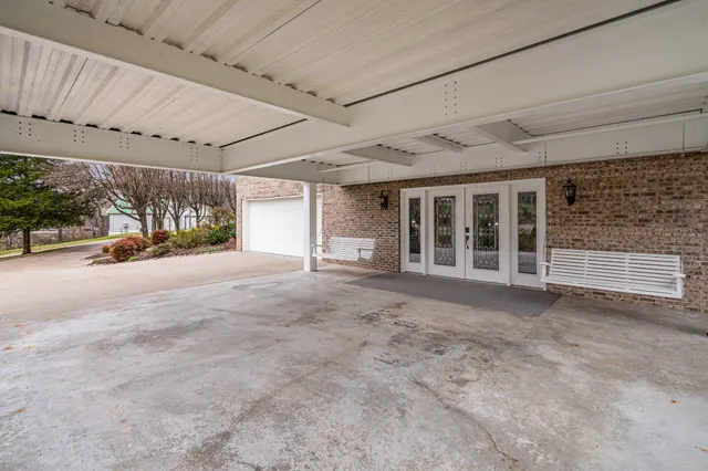 a view of a park with large trees