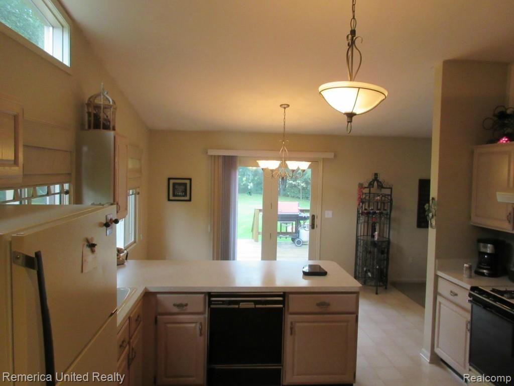27465 Martindale Road New Hudson, MI 48165 - Photo 18 of 42 KITCHEN OVER LOOKING DOOR WALL