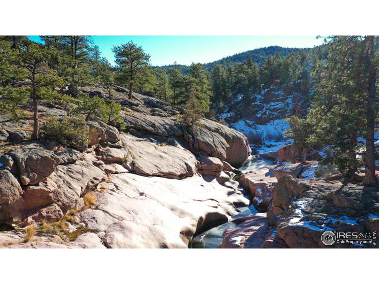 0 Tbd) Pima Road Lyons, CO 80540 - Photo 18 of 31 a black and white photo of a house