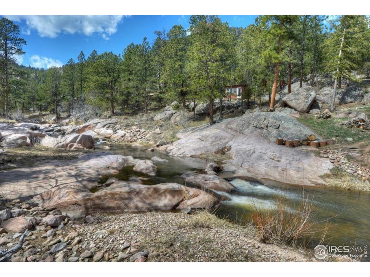 0 Tbd) Pima Road Lyons, CO 80540 - Photo 29 of 31 a view of a lake with mountain