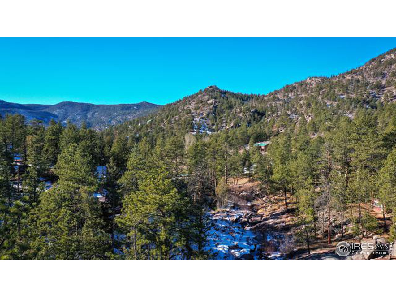 0 Tbd) Pima Road Lyons, CO 80540 - Photo 6 of 31 a balcony with a view of mountains in the background
