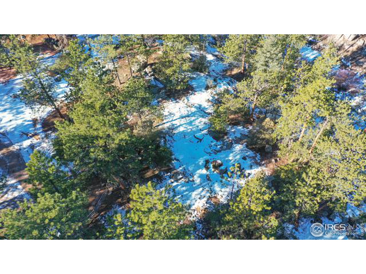 0 Tbd) Pima Road Lyons, CO 80540 - Photo 9 of 31 a black and white photo of a house