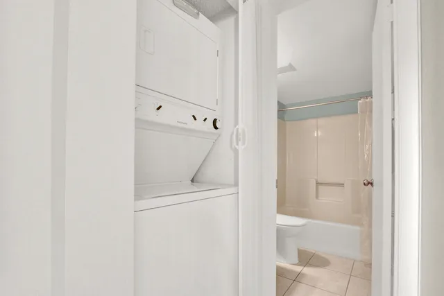 a bathroom with a shower and toilet