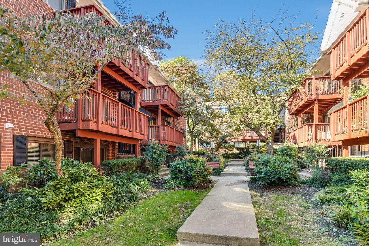 204 Skyhill Road, Unit 7 Alexandria, VA 22314 - Photo 19 of 20 a front view of a multi story building with yard