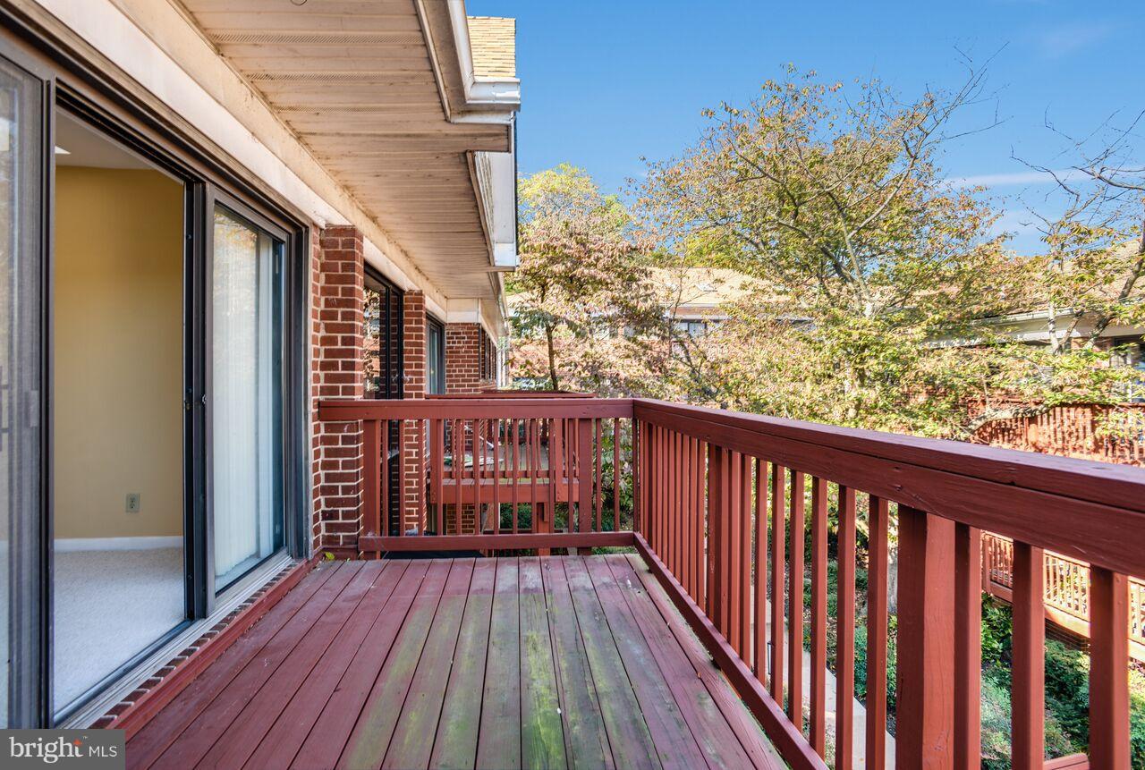 204 Skyhill Road, Unit 7 Alexandria, VA 22314 - Photo 5 of 20 a view of balcony with wooden floor