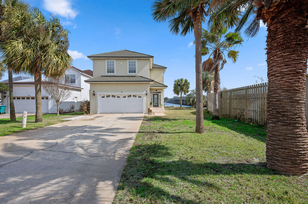 901 Lighthouse Road Fort Walton Beach, FL 32547 - Photo 2 of 83 a view of a house with a yard