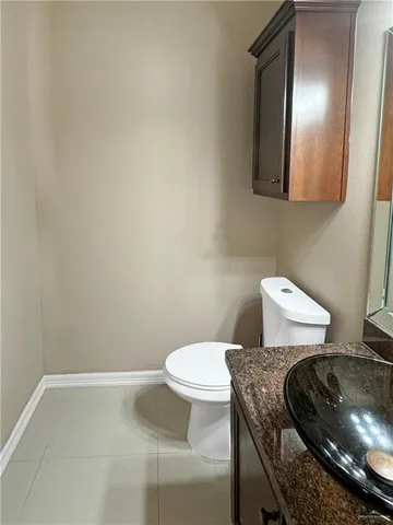 a bathroom with a toilet and a sink