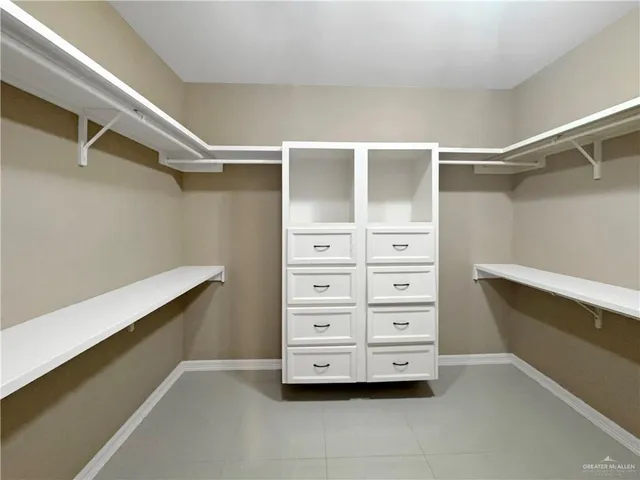 a view of an empty walk in closet