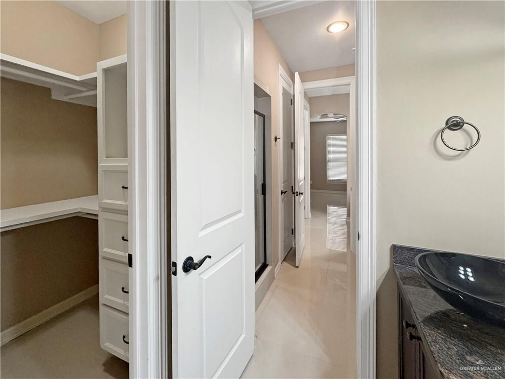 1909 North 45th Street McAllen, TX 78501 - Photo 21 of 22 a bathroom with a shower and a glass door