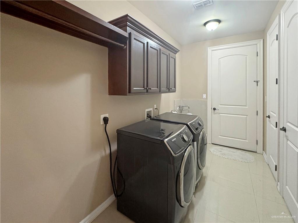 1909 North 45th Street McAllen, TX 78501 - Photo 3 of 22 a utility room with dryer and washer