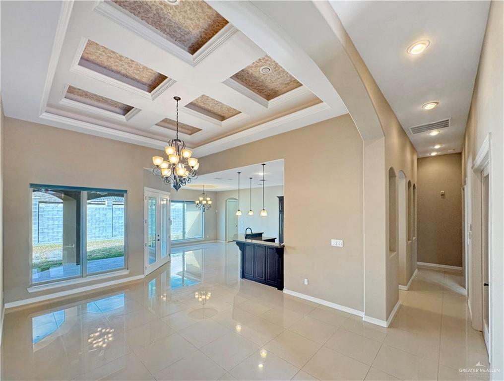 1909 North 45th Street McAllen, TX 78501 - Photo 4 of 22 wooden floor in an empty room with a bathroom