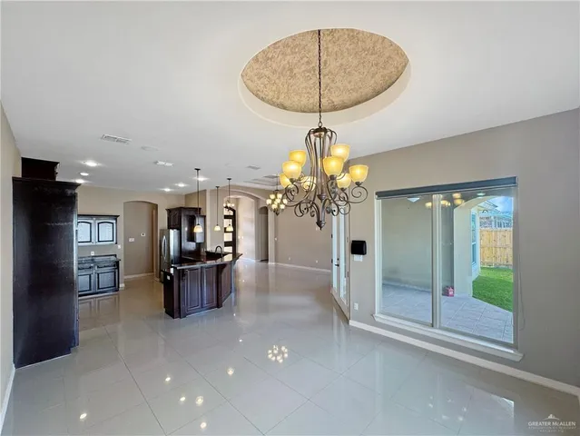 a view of a chandelier and chandelier in a room