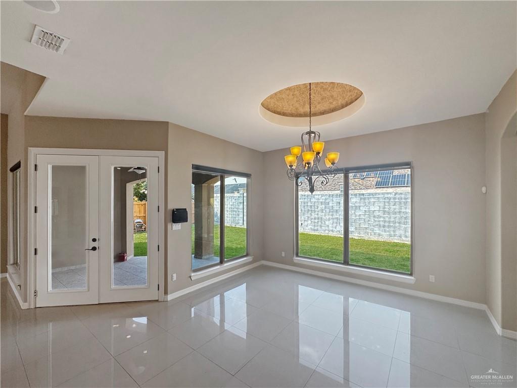 1909 North 45th Street McAllen, TX 78501 - Photo 10 of 22 a view of an entryway with a chandelier