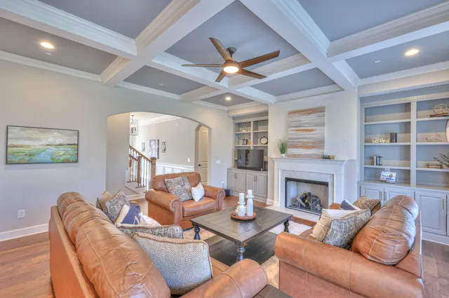 an aerial view of a residential houses with outdoor space