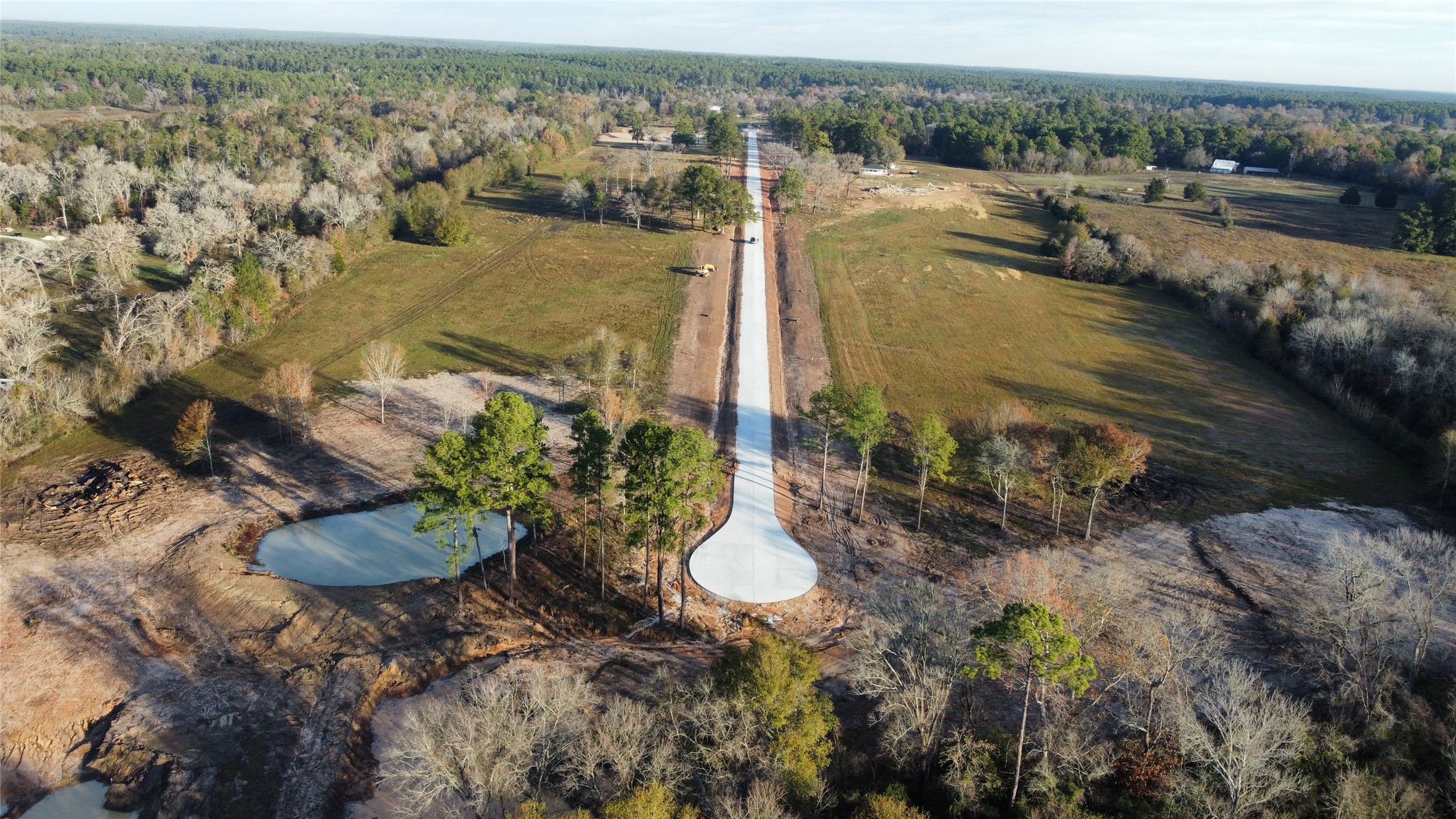 15445 Highlander Court Montgomery, TX 77356 - Photo 10 of 14 a view of a lake with outdoor space