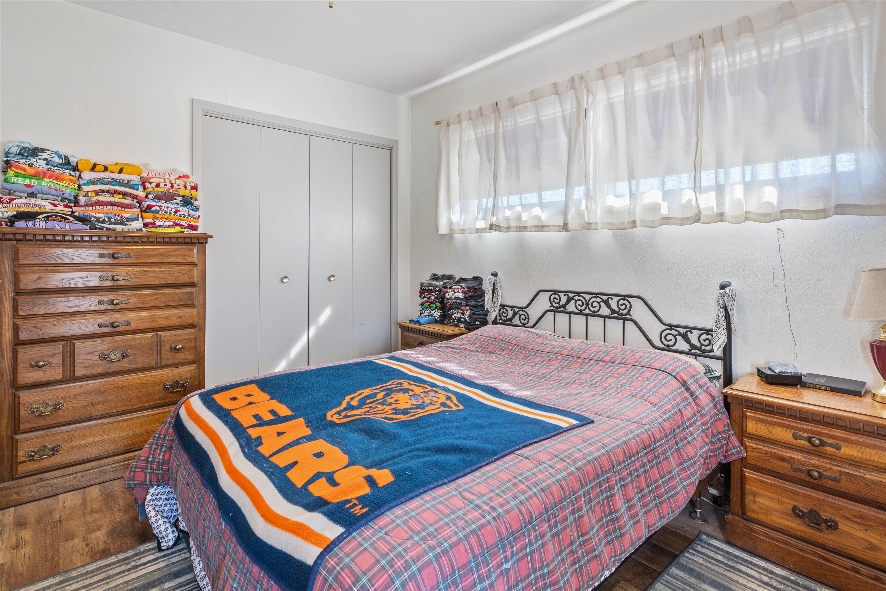 1631 Rural Street Rockford, IL 61107 - Photo 26 of 36 a bedroom with a bed and a dresser in it