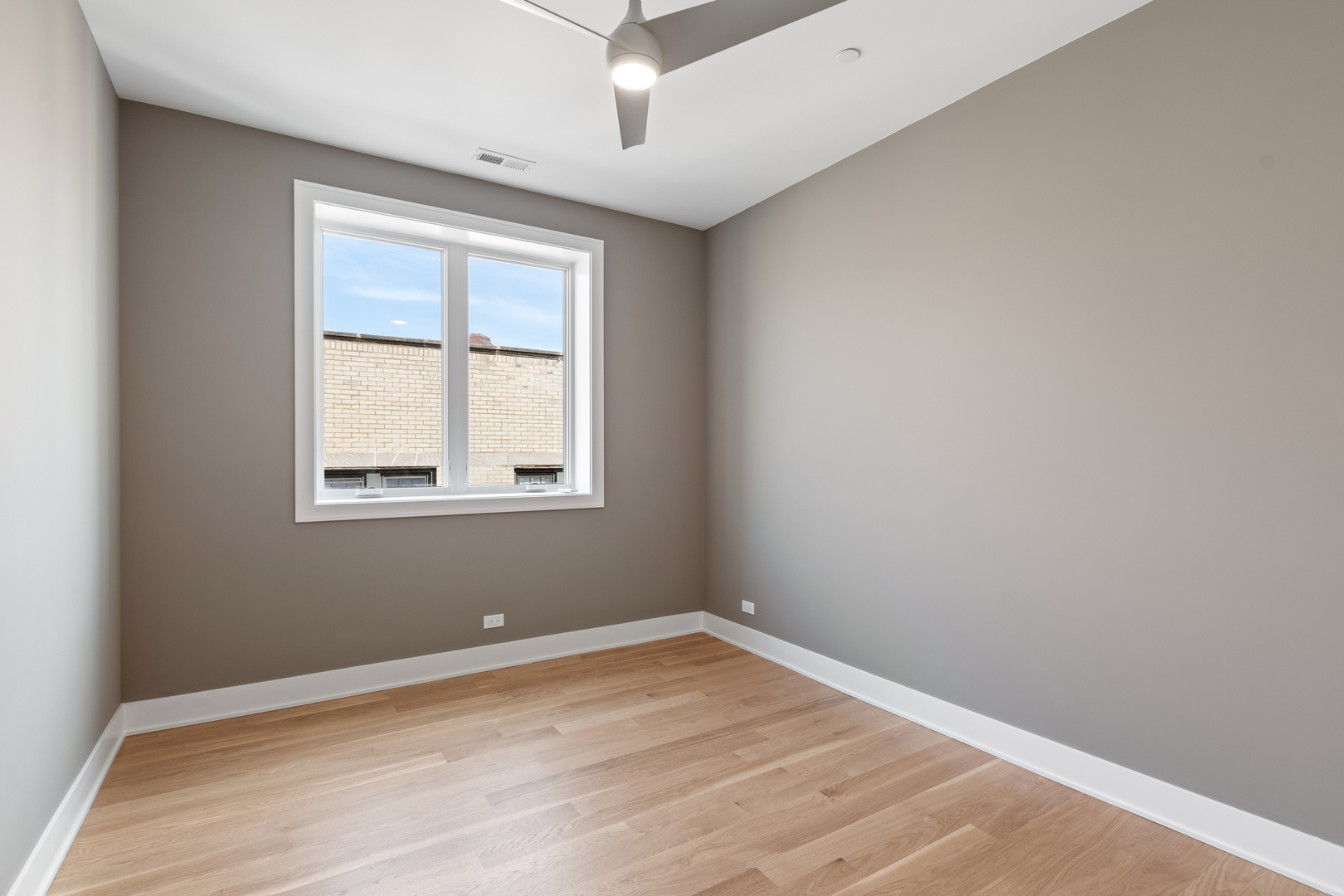 Undisclosed Address Chicago, IL 60640 - Photo 12 of 23 an empty room with a window