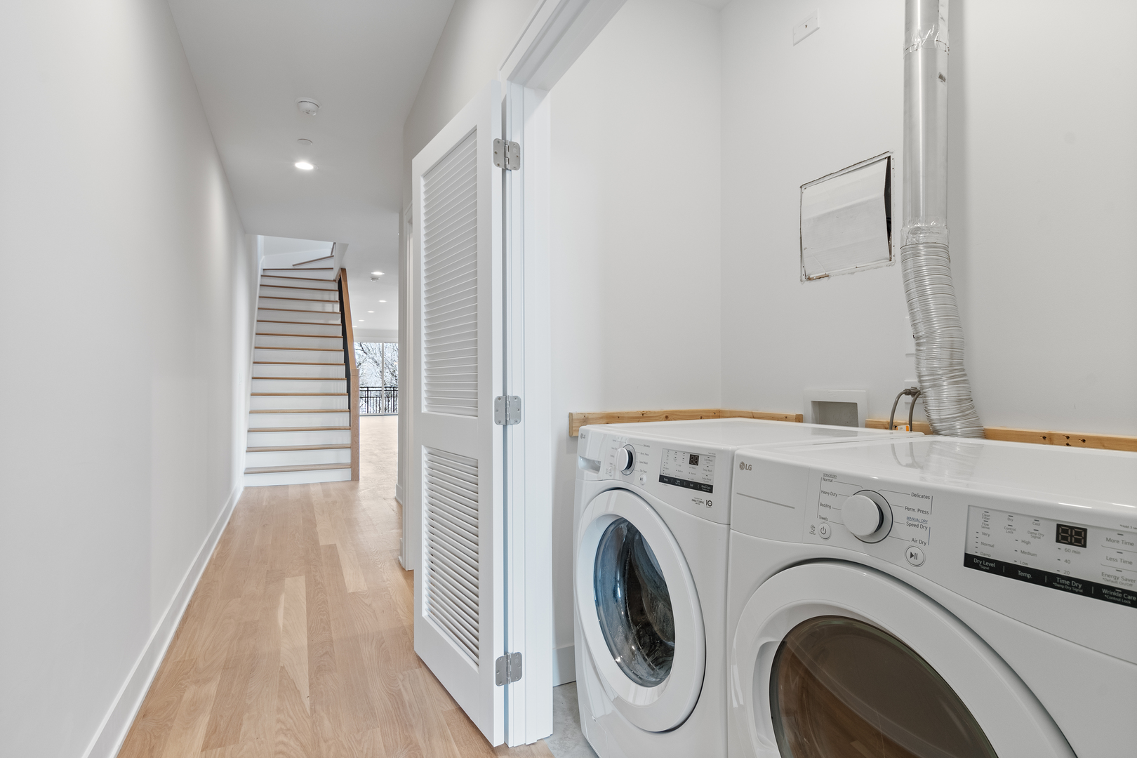 Undisclosed Address Chicago, IL 60640 - Photo 15 of 23 a view of livingroom with washer and dryer