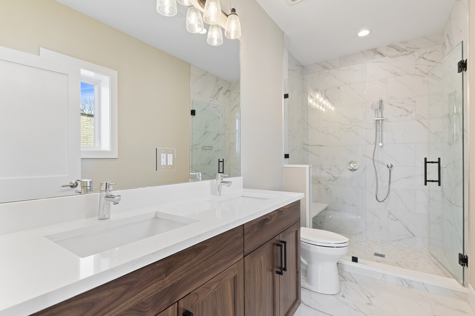 Undisclosed Address Chicago, IL 60640 - Photo 19 of 23 a bathroom with a sink a toilet and shower