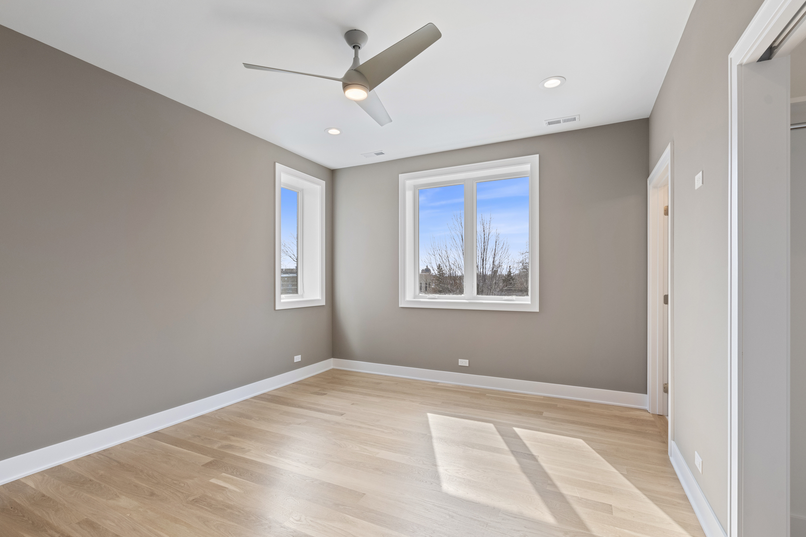 Undisclosed Address Chicago, IL 60640 - Photo 22 of 23 a view of an empty room with a window