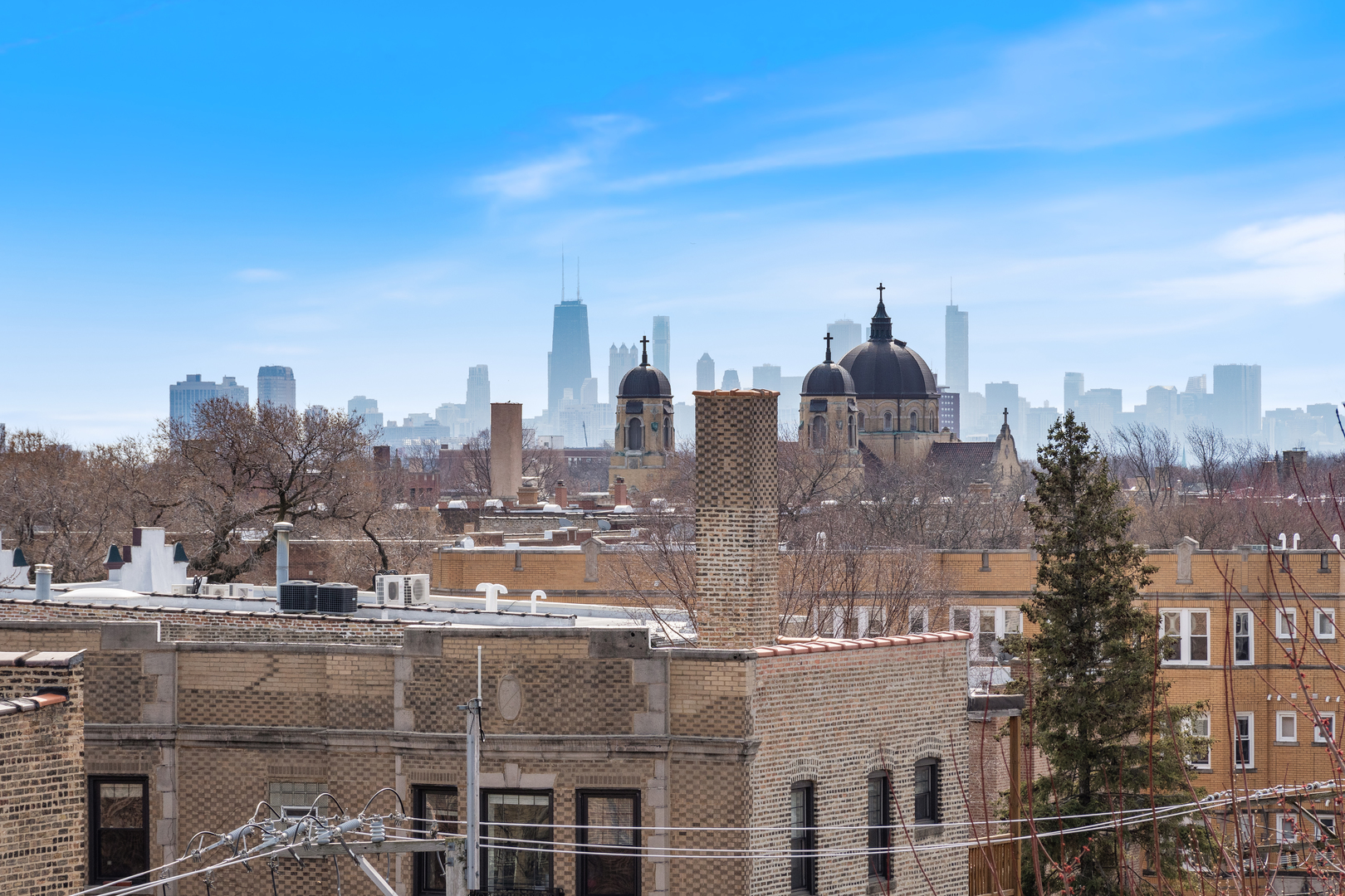 Undisclosed Address Chicago, IL 60640 - Photo 23 of 23 a view of a city with tall buildings