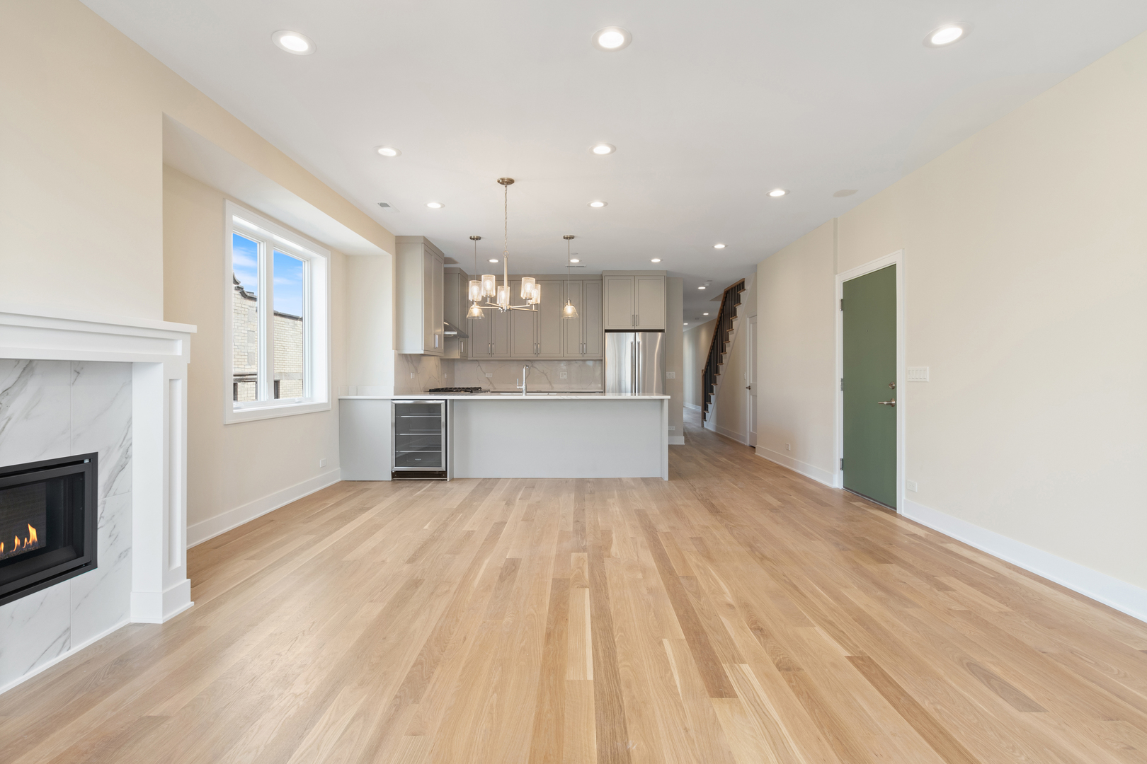 Undisclosed Address Chicago, IL 60640 - Photo 3 of 23 a view of a kitchen with a sink and a fireplace