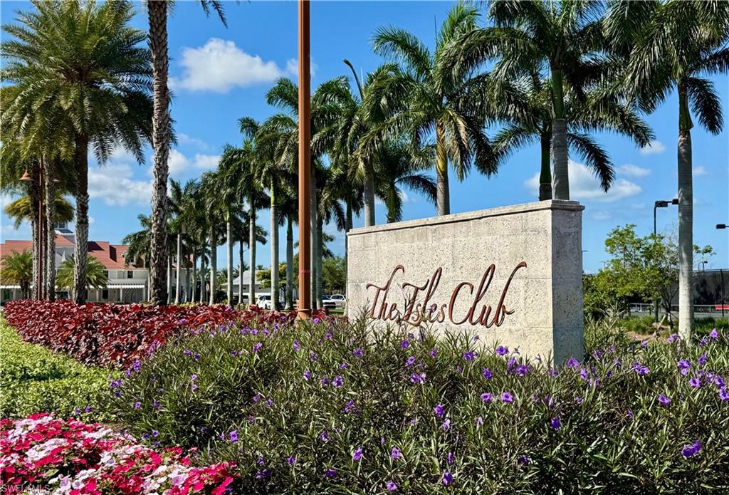 6466 Warwick Avenue Naples, FL 34113 - Photo 29 of 43 a sign on the side of the road