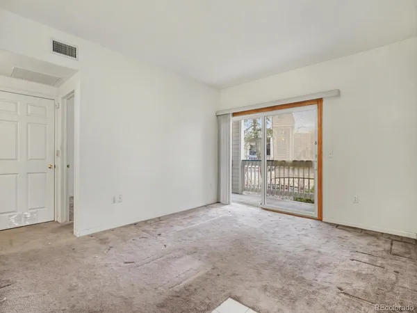 a view of a room with stairs