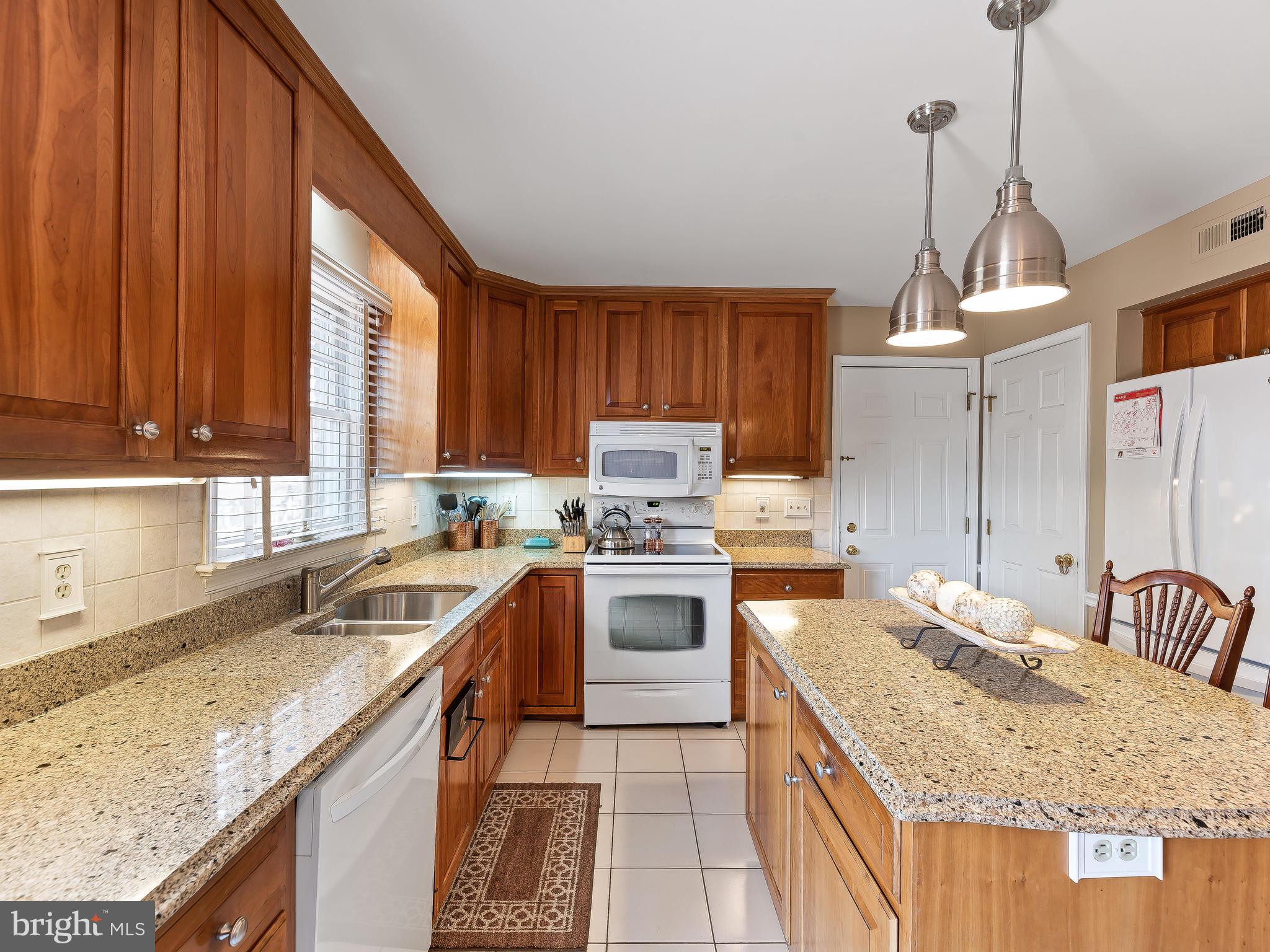 8168 Stone Ridge Drive Frederick, MD 21702 - Photo 8 of 50 Granite Counters and new appliances