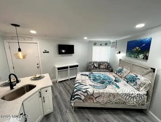 a bedroom with a bed and a couch