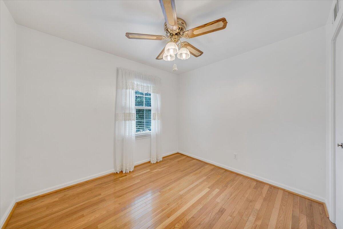 102 Deep Dell Road Salem, VA 24153 - Photo 54 of 74 an empty room with a window and a fan