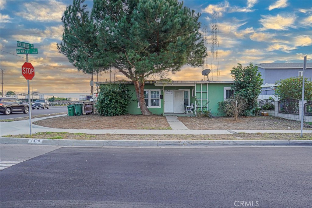 1400 West Bennett Street Compton, CA 90220 - Photo 1 of 1 a view of house with outdoor space and trees