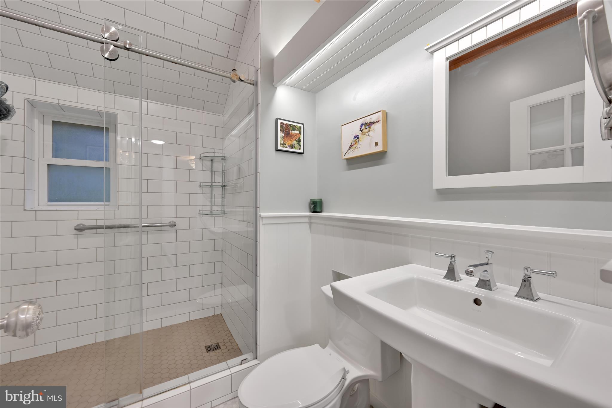 609 6th Street Mount Gretna, PA 17064 - Photo 25 of 39 a bathroom with a sink toilet and shower