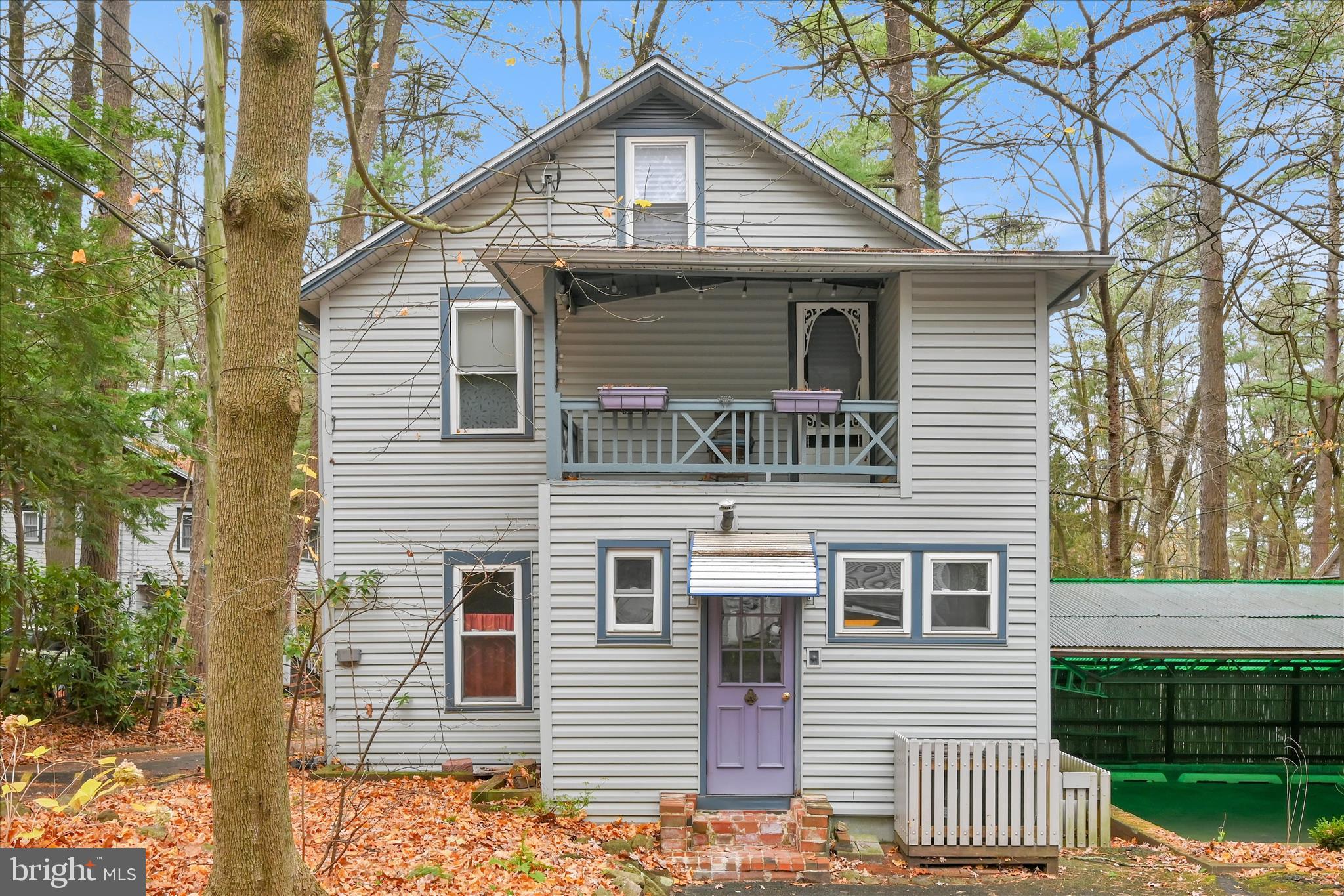 609 6th Street Mount Gretna, PA 17064 - Photo 6 of 39 a front view of a house with a yard