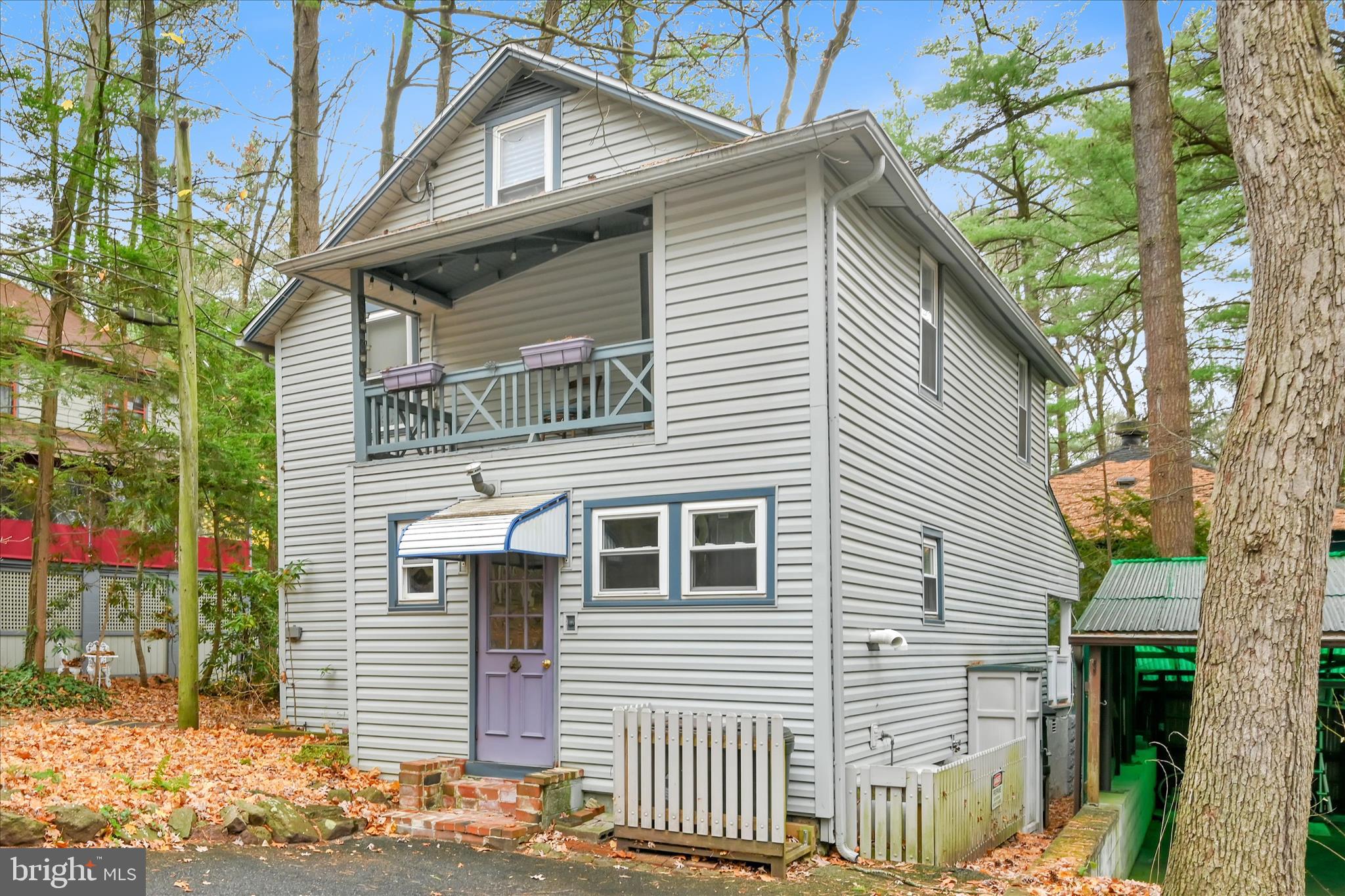 609 6th Street Mount Gretna, PA 17064 - Photo 7 of 39 a view of a house with a yard