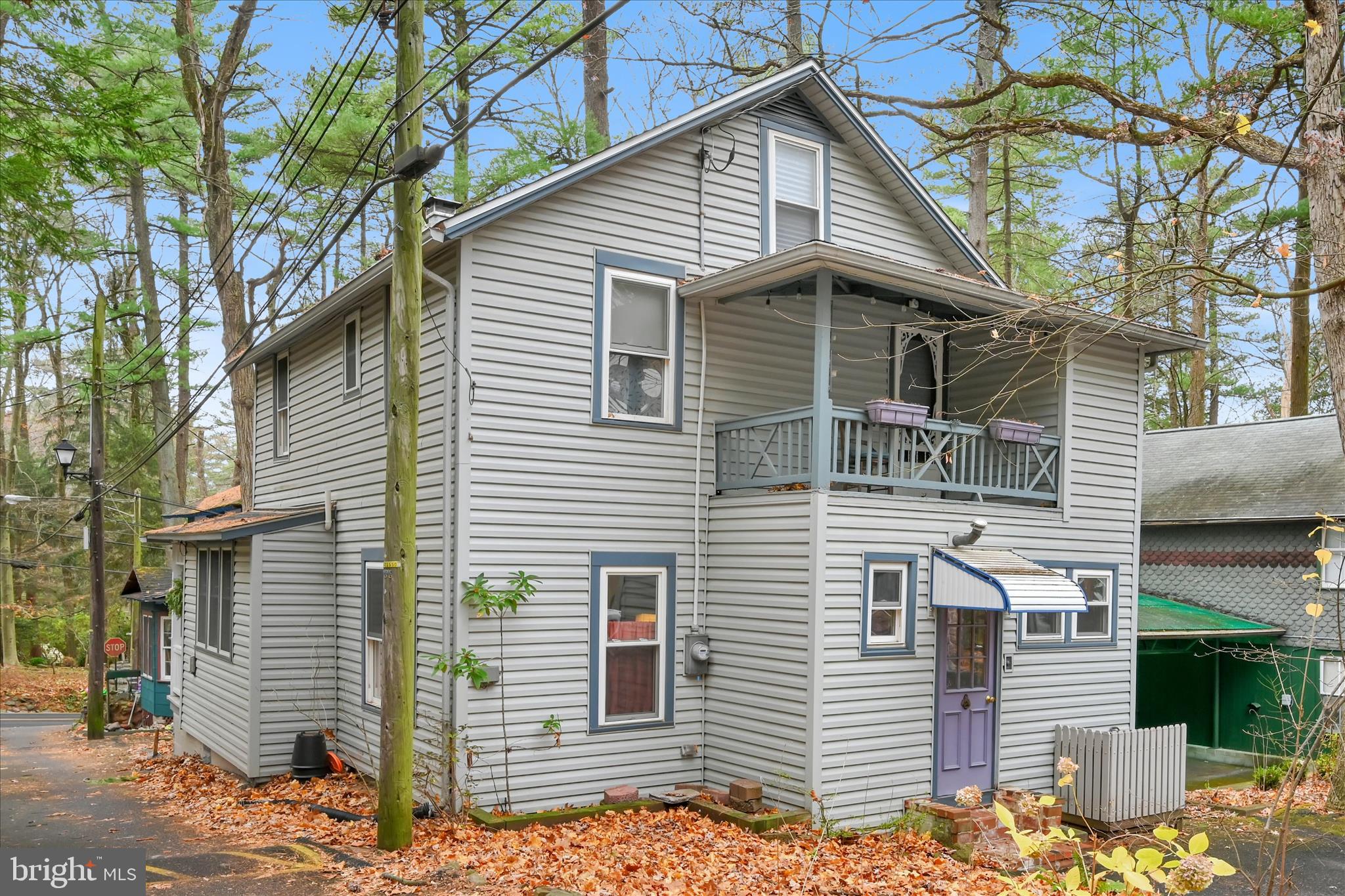 609 6th Street Mount Gretna, PA 17064 - Photo 9 of 39 a front view of a house with a tree