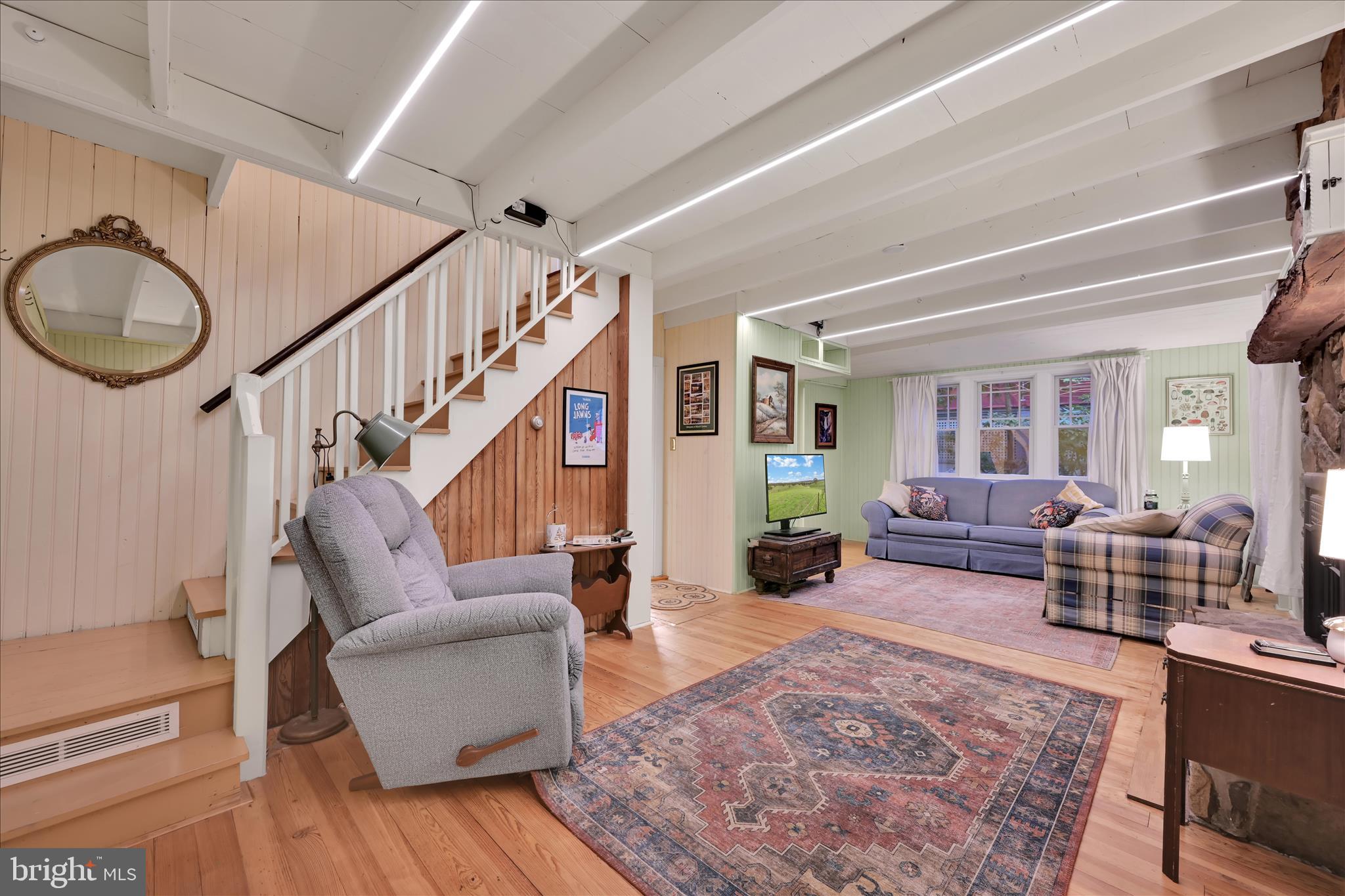 609 6th Street Mount Gretna, PA 17064 - Photo 10 of 39 a living room with furniture or couch and a wooden floor