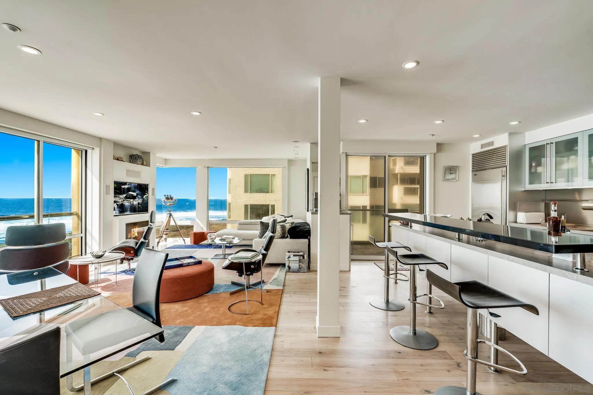 202 Coast Boulevard, Unit 6 La Jolla, CA 92037 - Photo 3 of 22 a living room with furniture kitchen view and a large window